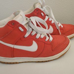Red nikes with white accents